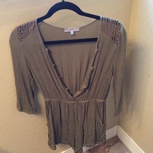 Dark green romper. Size small and only worn once.